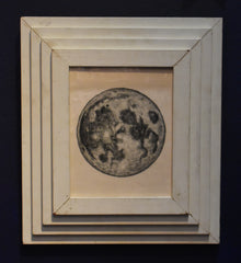  The Moon, presented in a Gluck frame