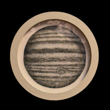  Jupiter, presented in a small circular frame