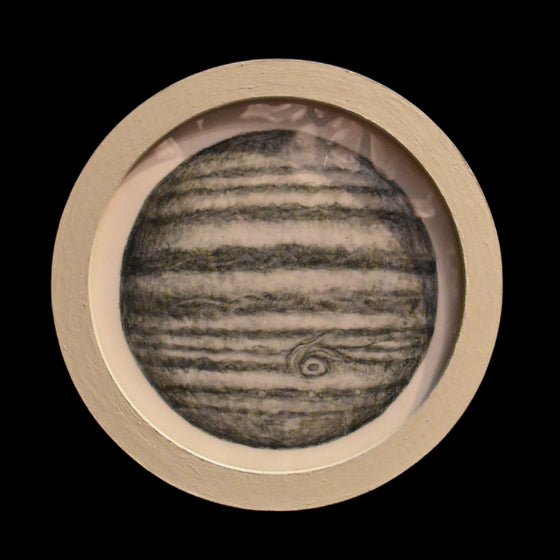 Jupiter, presented in a small circular frame